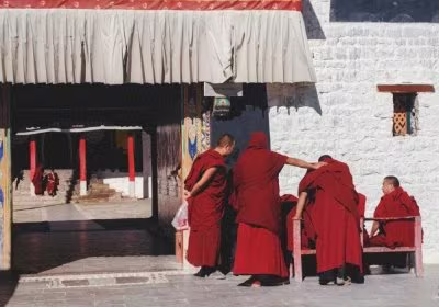 Traveler photo: Tibetan monks in red robes, one of the typical scenery inside Tibetan monasteries. (December 2025)	