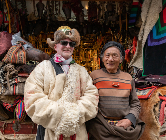 dressed in traditional tibetan dress and took photos with local tibetans
