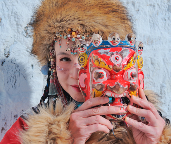 our guests dressed in traditional tibetan costume with masks for photoshooting
